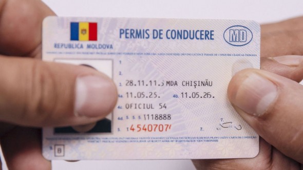 Verișorul lui Vladimir Andronachi, reţinut într-un dosar de corupţie cu permise de conducere